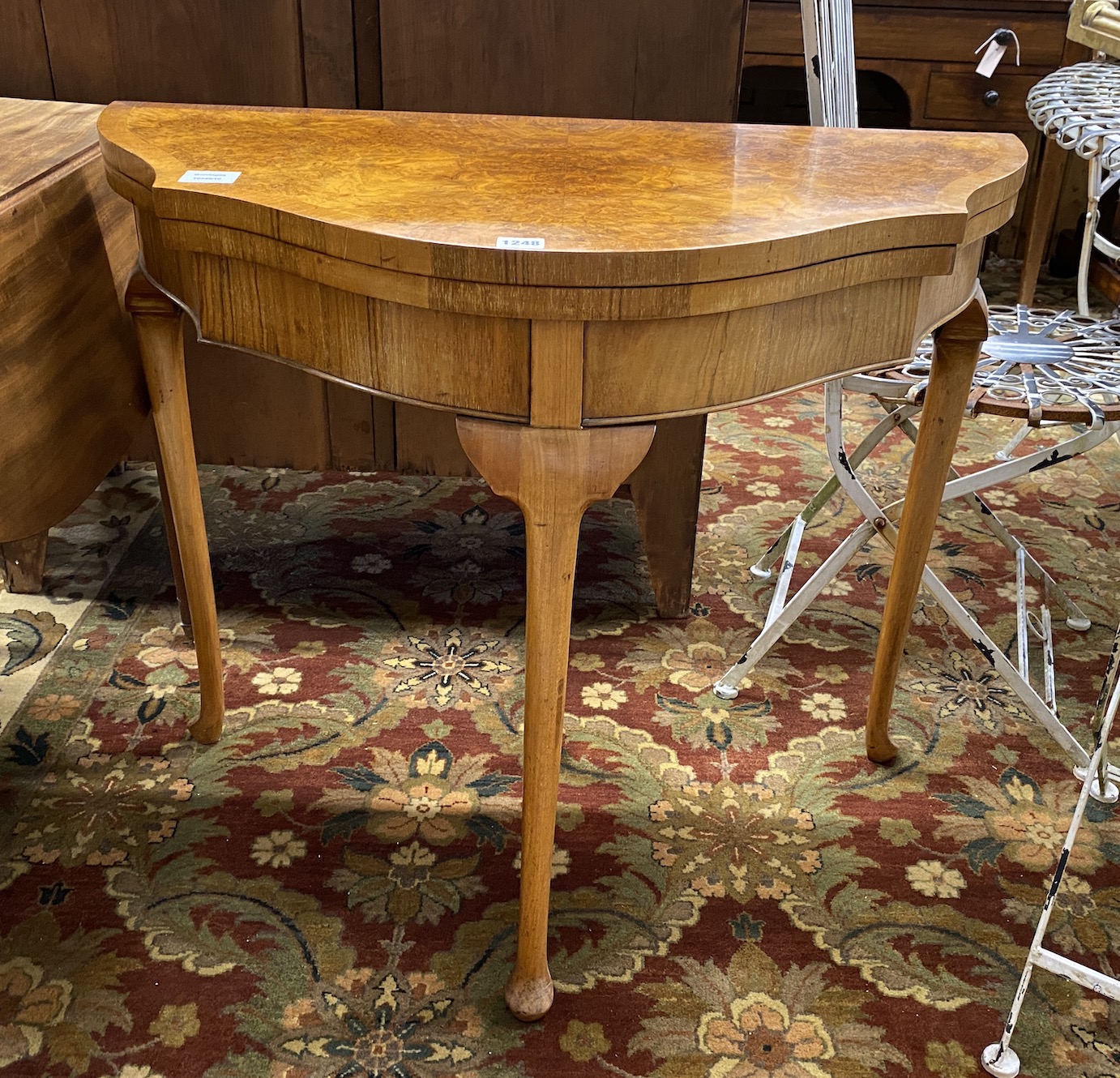 A Queen Anne revival burr walnut folding card table, width 84cm, depth 41cm, height 73cm